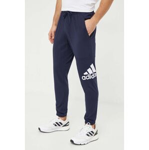 Tepláky adidas tmavomodrá farba, s potlačou