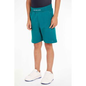 Detské krátke nohavice Calvin Klein Jeans zelená farba