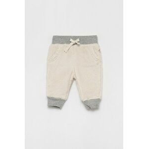 Detské nohavice GAP krémová farba, jednofarebné