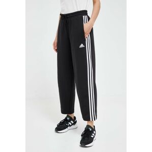 Tepláky adidas čierna farba, s nášivkou