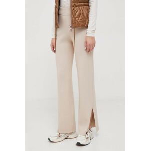 Nohavice s prímesou vlny Calvin Klein béžová farba, široké, vysoký pás