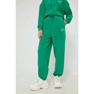 Tepláky Tommy Jeans dámske, zelená farba, jednofarebné