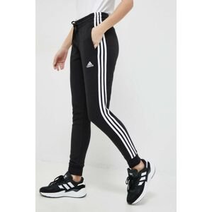 Tepláky adidas čierna farba, s nášivkou