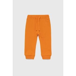 Detské bavlnené nohavice United Colors of Benetton oranžová farba, s potlačou