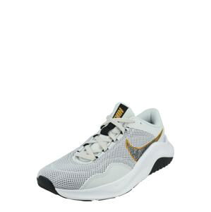 NIKE Športová obuv 'Legend Essential 3'  zlatá / čierna / strieborná / biela